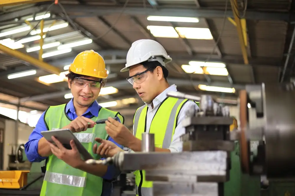 Asian,Engineering,Manager,And,Mechanic,Worker,In,Safety,Hard,Hat